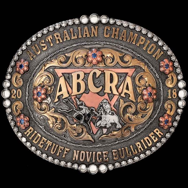 The Mount Isa Buckle has a unique design with a barbed wire inner frame that will give a country feel to any rodeo winners' outfit. Featuring our signature berry frame. Customize this buckle today!